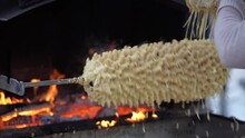 Sakotis is a Polish Lithuanian traditional spit cake. It is a cake made of butter, egg whites and yolks, flour, sugar, and cream, cooked on a rotating spit in an oven or over an open fire