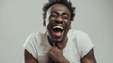 Fototapeta  - Positive and joyful Afro American male with fine crop of hair bursting into laughing holding his hands on stomach cant stopping laughing after hearing funny anecdote Positive emotions  : Generative AI