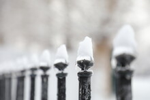 Fence Covered With Snow And Ice
