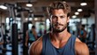 portrait of a handsome bodybuilder blur gym background