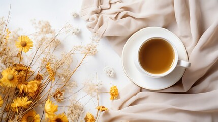 Wall Mural - Hello Autumn flat lay background. Top view of workspace or office desk with vintage photo camera, sweater, cup of coffee, honey cookies, flowers and gold ears of wheat on textured white background