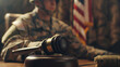 View of military court, gavel with soldier.