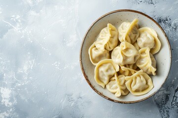 Sticker - Yellow dough dumplings on an old white table Free space for text