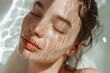 Young woman applying skincare product for healthy glowing skin