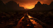 a dirt road running through the desert at sunset