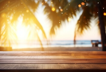 Wall Mural - Sunset view over a wooden table with tropical beach and palm trees in the background