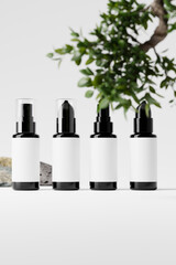 Wall Mural - cosmetic branding mockup set featuring a spray bottle and a pump bottle.