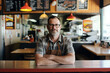 © kleberpicui - A proud owner smiling while working in his diner