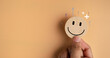 Happy smile relax face in wooden lable. Emotion happiness feed good positive thinking concept. Customer review assessment quality or feedback good mood, Happy mental.