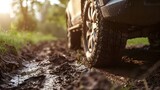 Fototapeta  - Close-up of SUV wheels for traveling on dirt roads.
