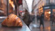 Un croissant devant une boulangerie de Paris » IA générative