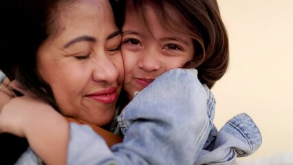 happy asian mother hugging daughter child. indigenous culture. family love concept