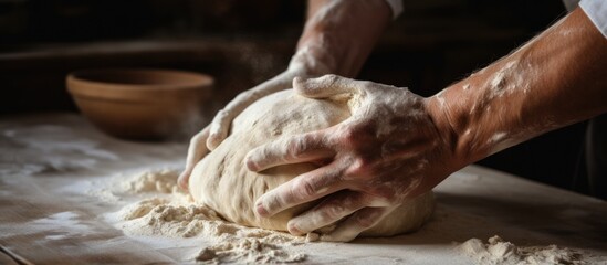 man making bread dough