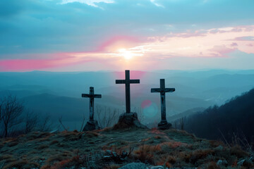 Three crosses stand on a hill with a stunning sunset in the background, symbolizing faith, hope, and spirituality.