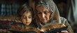 Bible study, worship, or grandmother praying with kids or siblings as support, encouragement, or hope in Christianity. Children's education, family, or old woman studying, reading books, or learning