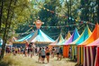 © Iftikhar alam - Group of People Standing in Front of Tents at a Campsite, Fun and vibrant open-air summer music festival with multicolored tents and happy people, AI Generated