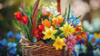 A close up shot of colorful spring flowers arranged in a basket symbolizing the beauty of the season