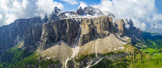 Wall Mural - Breathtaking panorama of beautiful Alps mountains Dolomites, Val Gardena. Aerial drone panoramic view . northern Italy. Alpine nature scenery.