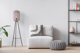 Fototapeta  - View of modern scandinavian style interior with sofa, lamp and bookcase, Home staging and minimalism concept