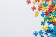© Oksana - Puzzle pieces, mosaics for world Autism Awareness Day, Copy space, background for flyer, poster edge, banner