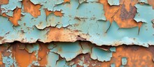 Aged And Weathered Rusty Wall With Peeling Paint Textures In An Abandoned Building