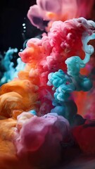 Leinwandbilder - Beautiful multi-colored smoke spreads on a black background