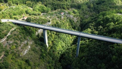 Wall Mural - The bridge leading to the village of Rivello in Europe, Italy, Basilicata, towards Potenza, in summer, on a sunny day.