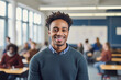 Portrait of smiling African American male student standing in classroom
