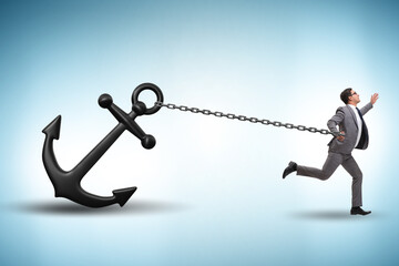 Businessman with anchor in business concept