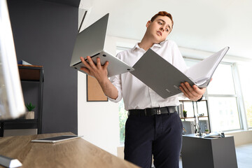 Poster - Young businessman working in office