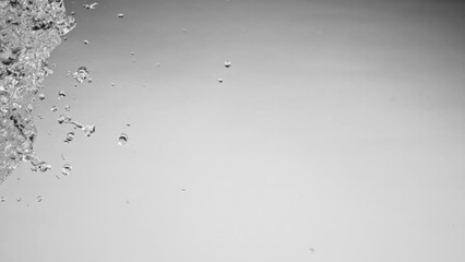 Poster - Super Slow Motion of Flying Water Splashes, Isolated on Grey Background. Filmed on High Speed Cinema Camera, 1000fps.