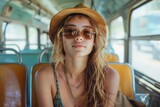 Fototapeta Londyn - A young woman travels on public transport from work. Background with selective focus and copy space