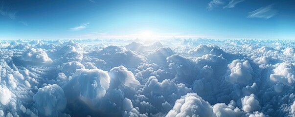 Wall Mural - a stunning aerial panorama of dense cumulus clouds bathed in sunlight, with a clear blue sky above.