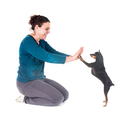 Poster - miniature pinscher and woman in studio