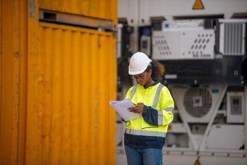 Engineers railway survey wearing safety uniform and helmet under conversation document on hand inspect checking cargo containers railway work on railroad station is transportation industry concept