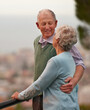 © peopleimages.com - Love, marriage and elderly couple on balcony of home together with view of nature for romantic getaway. Smile, anniversary or bonding with happy senior man and woman outdoor on holiday or vacation