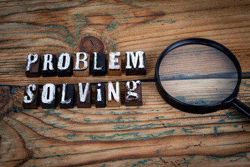 Wall Mural - PROBLEM SOLVING. Alphabet letters on wood texture background