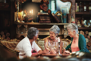 Canvas Print - Relax, wine and laugh with elderly friends in home for bonding, funny and smile. Retirement, diversity and happiness with group of senior female people with drink for social, memory and support