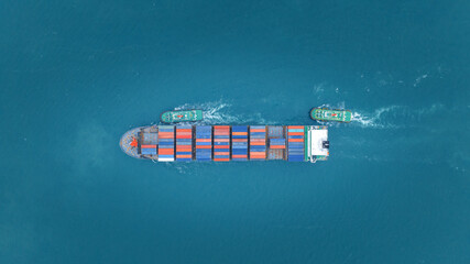 Cargo Container Ship running with with Tugboat. container ship import export to customers sea port. export shipping industry freight and transportation logistics concept.