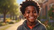 portrait of a happy black boy outside