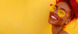 a beautiful girl in sunglasses with red lipstick on her lips smiles on a bright sunny day. Girl against the background of a yellow wall. Charming girl in red clothes. Banner