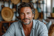 © ADDICTIVE STOCK - Confident mature man with a charming smile. Generative AI image