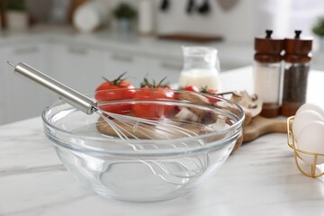 Wall Mural - Whisk, bowl, and different ingredients on white marble table indoors