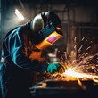 © Olha - welder welding sparks on a black background