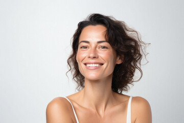 Wall Mural - happy attractive confident young adult or mid aged european woman posing for beauty aesthetic portra