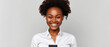 Happy attractive African American woman of middle age posing for beauty portrait. Pretty Black ethnic lady smiling on background, attractive female fashion model looking at camera. Close up face .