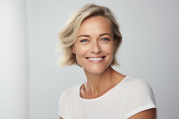 Wall Mural - happy attractive confident young adult or mid aged european woman posing for beauty aesthetic portra