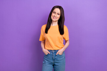 Wall Mural - Portrait of adorable lovely girl with stylish hairdo wear oversize t-shirt holding arms in pockets isolated on violet color background