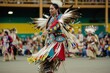 native american woman in full regalia dancing at a powwow