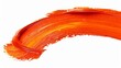 Vibrant orange paint stroke isolated on clean white background for design projects